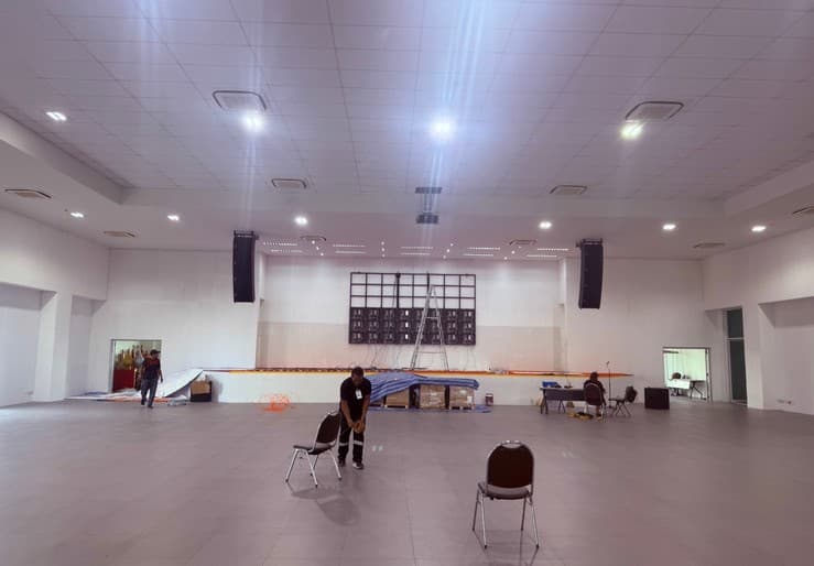 Wide auditorium interior view during renovation